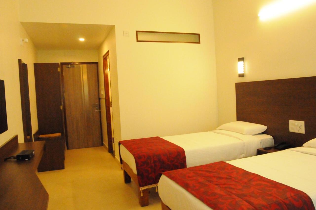 Palguni Residency Hotel Hassan Exterior photo