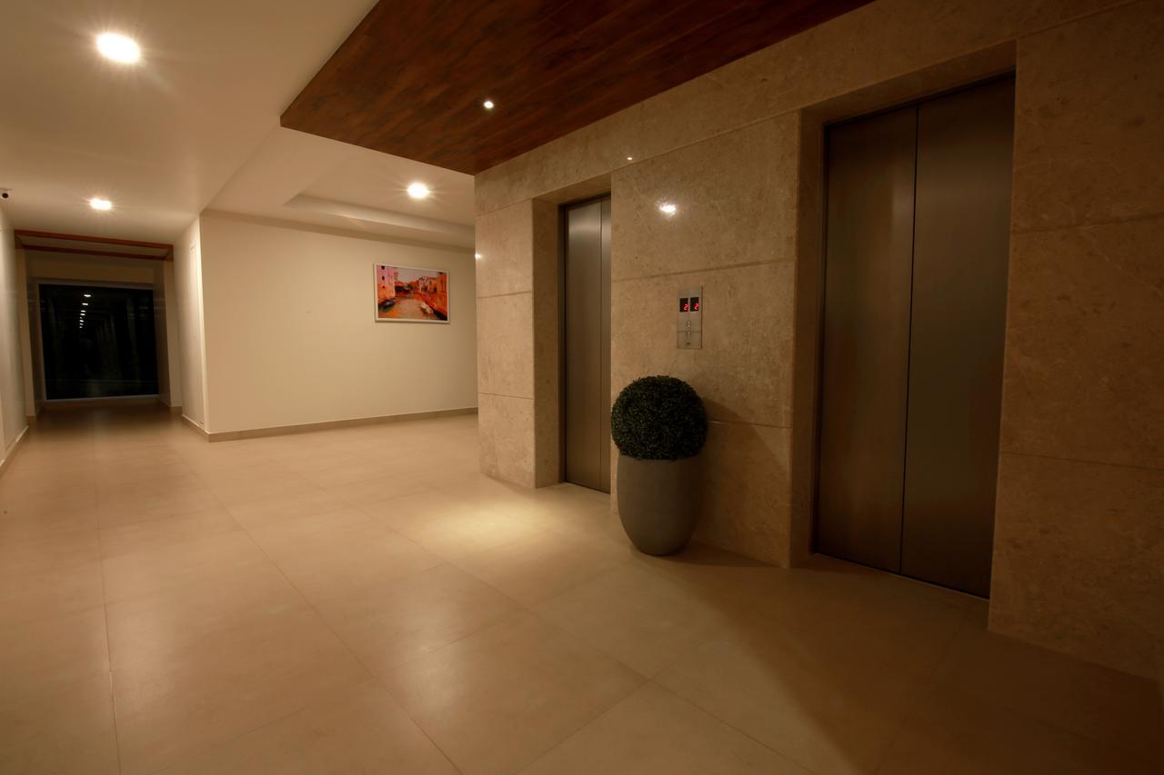 Palguni Residency Hotel Hassan Exterior photo