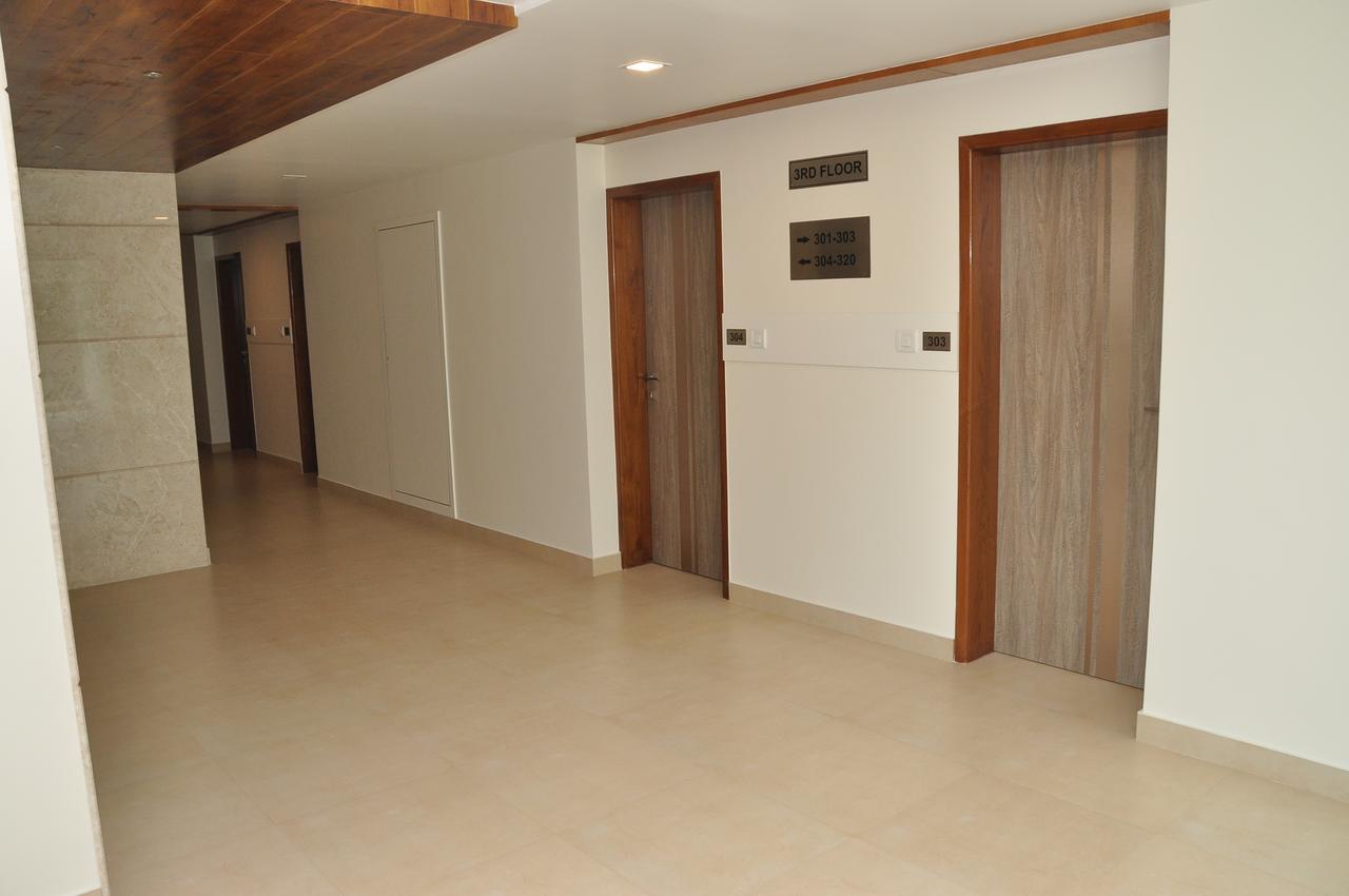 Palguni Residency Hotel Hassan Exterior photo