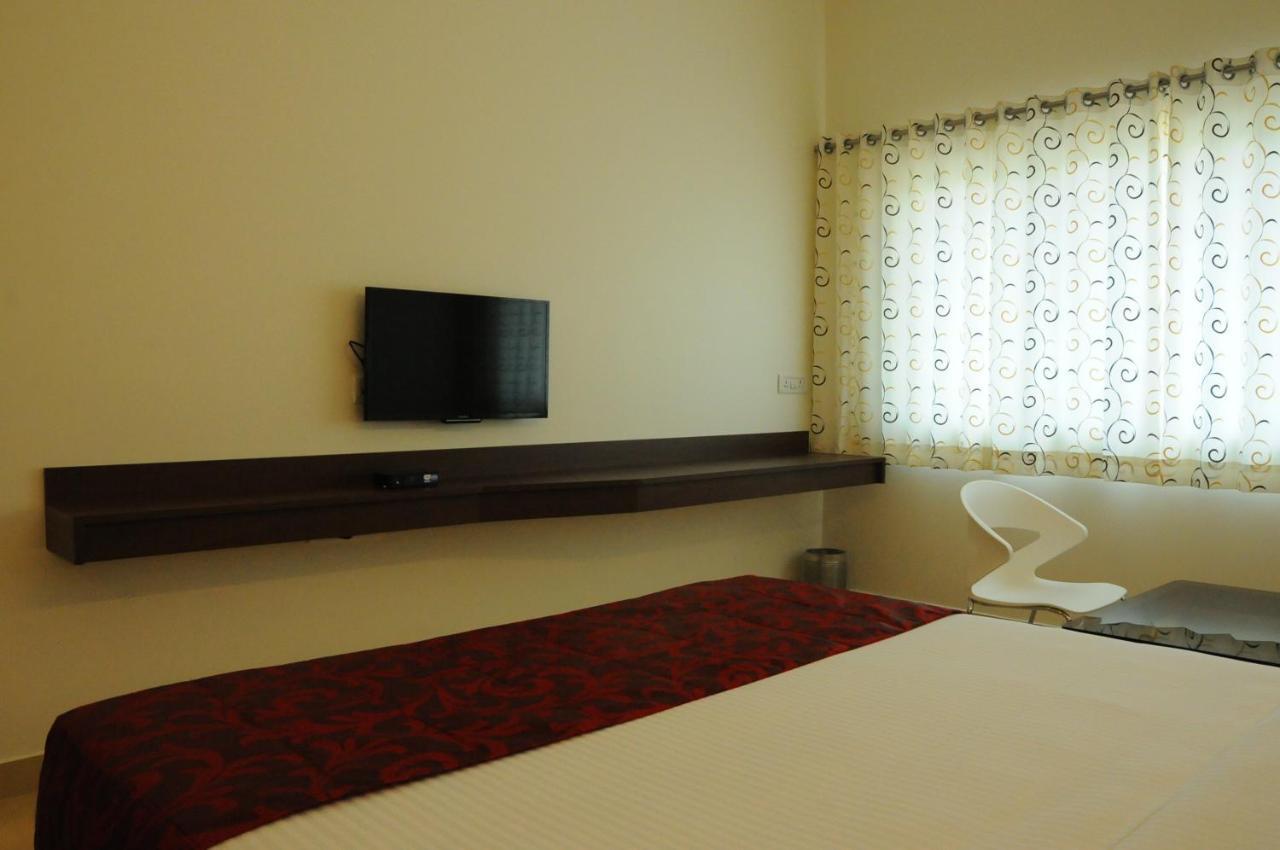 Palguni Residency Hotel Hassan Exterior photo