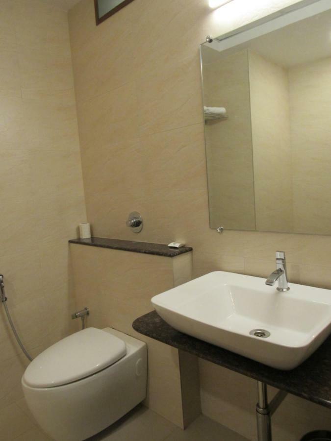 Palguni Residency Hotel Hassan Exterior photo